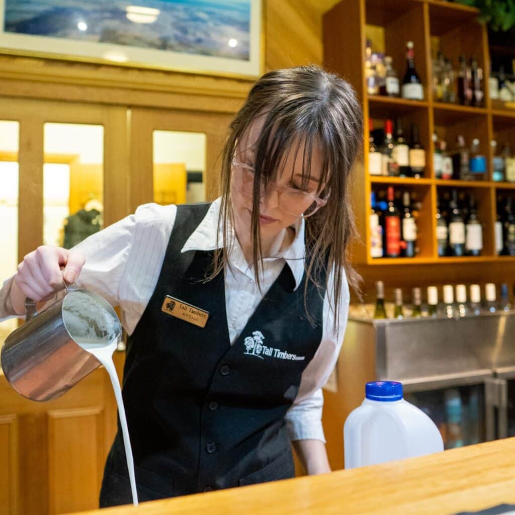 Aysha pouring warmed milk