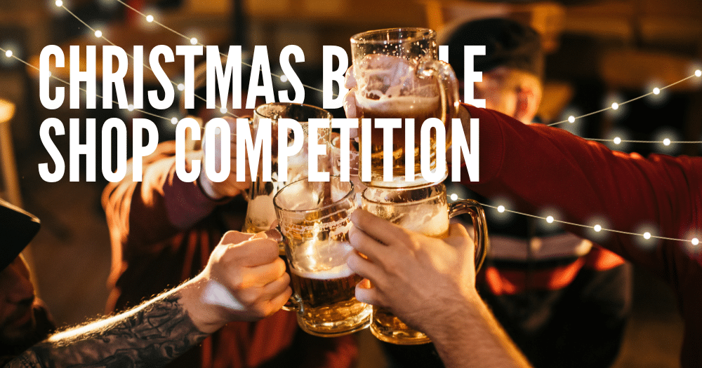 5 people cheering with half filled beer glasses with the text 'Christmas bottle shop compeitition'